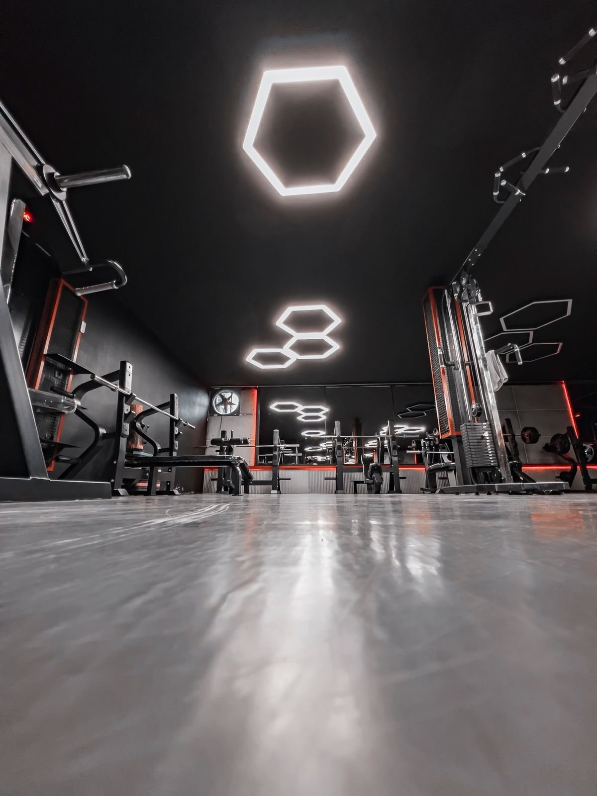 Modern gym fitout Dubai geometric lighting