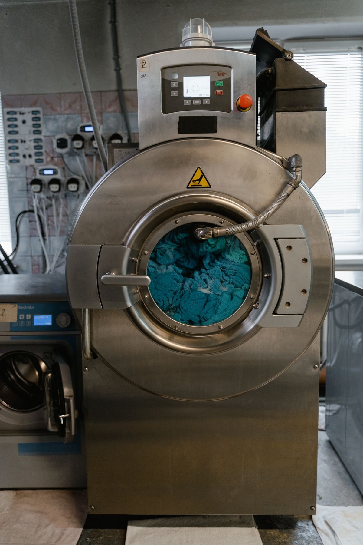 Washer dryer combo water leaking repair Dubai
