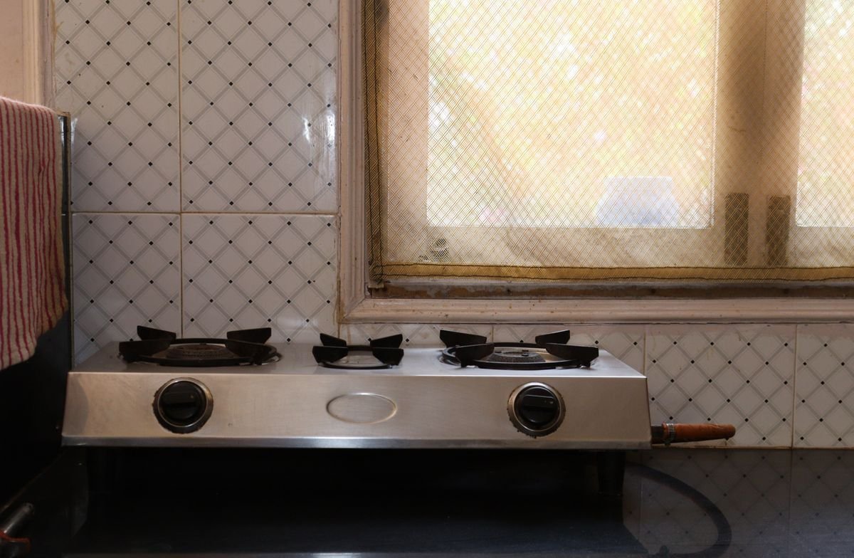 Stainless steel cooking range in a home kitchen