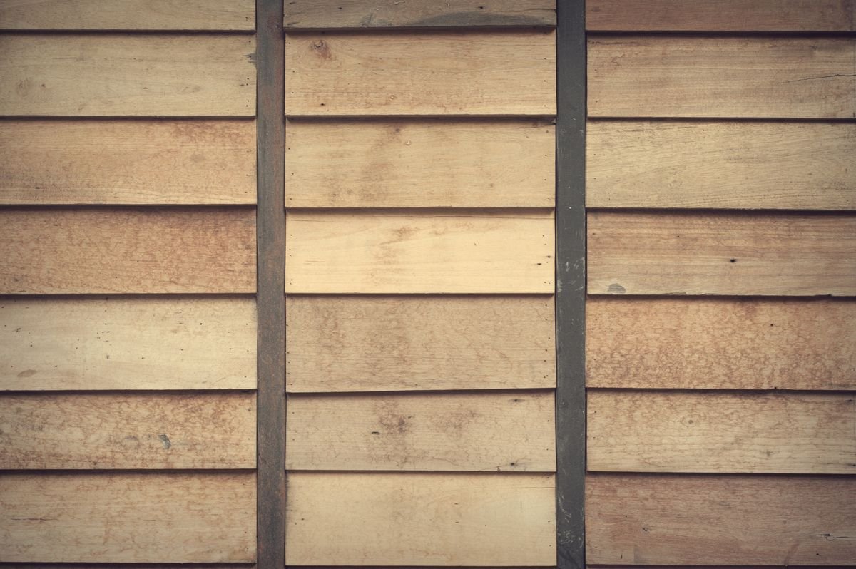 Close-up of a light brown wooden wall with horizontal planks