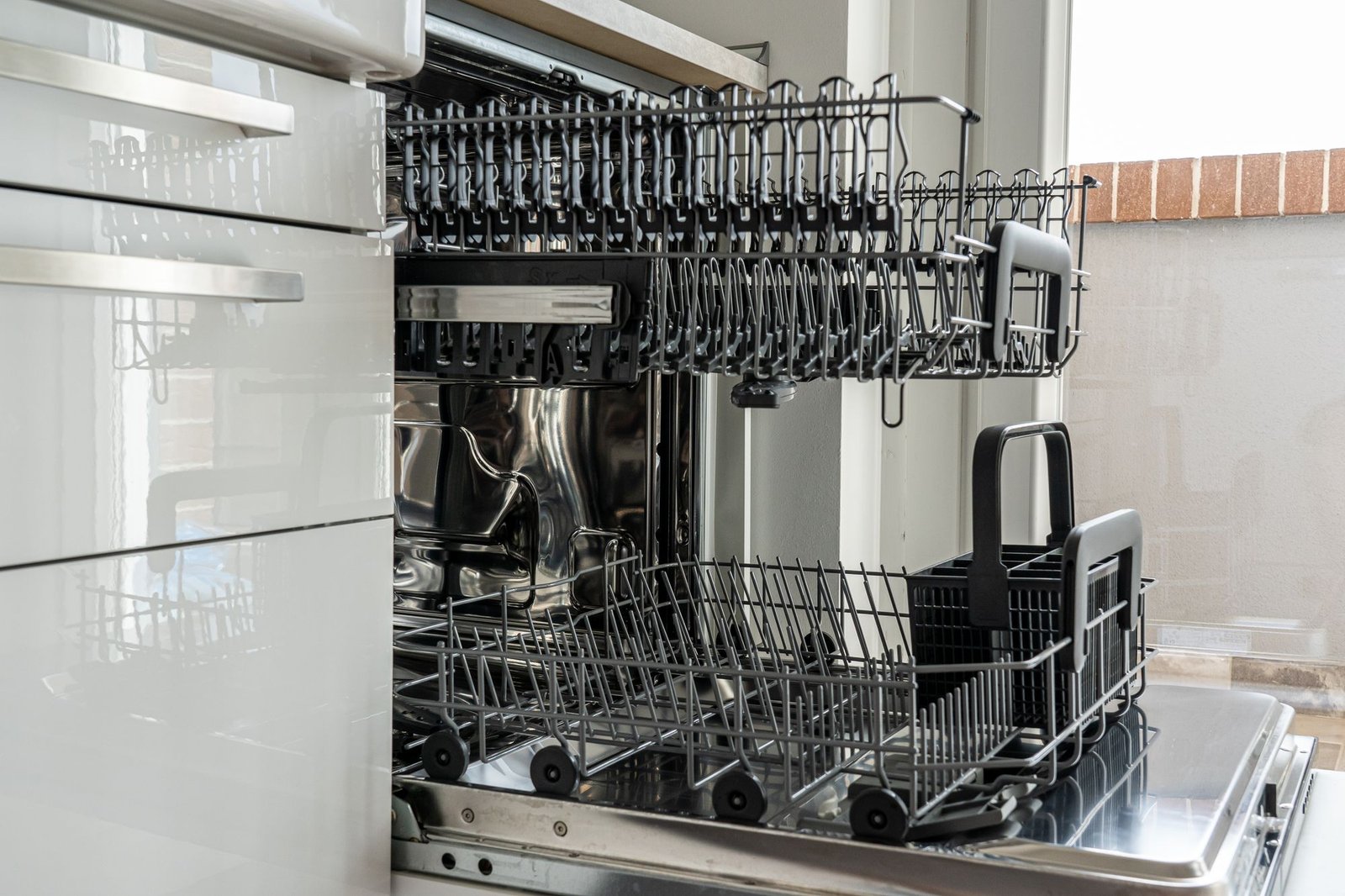 Open dishwasher in a Dubai kitchen