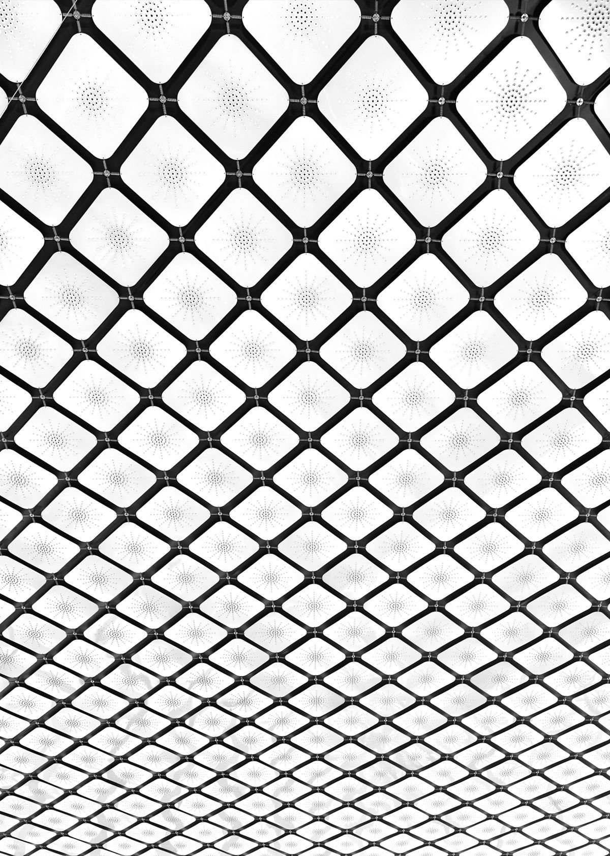 Black and white ceiling pattern of geometric panels
