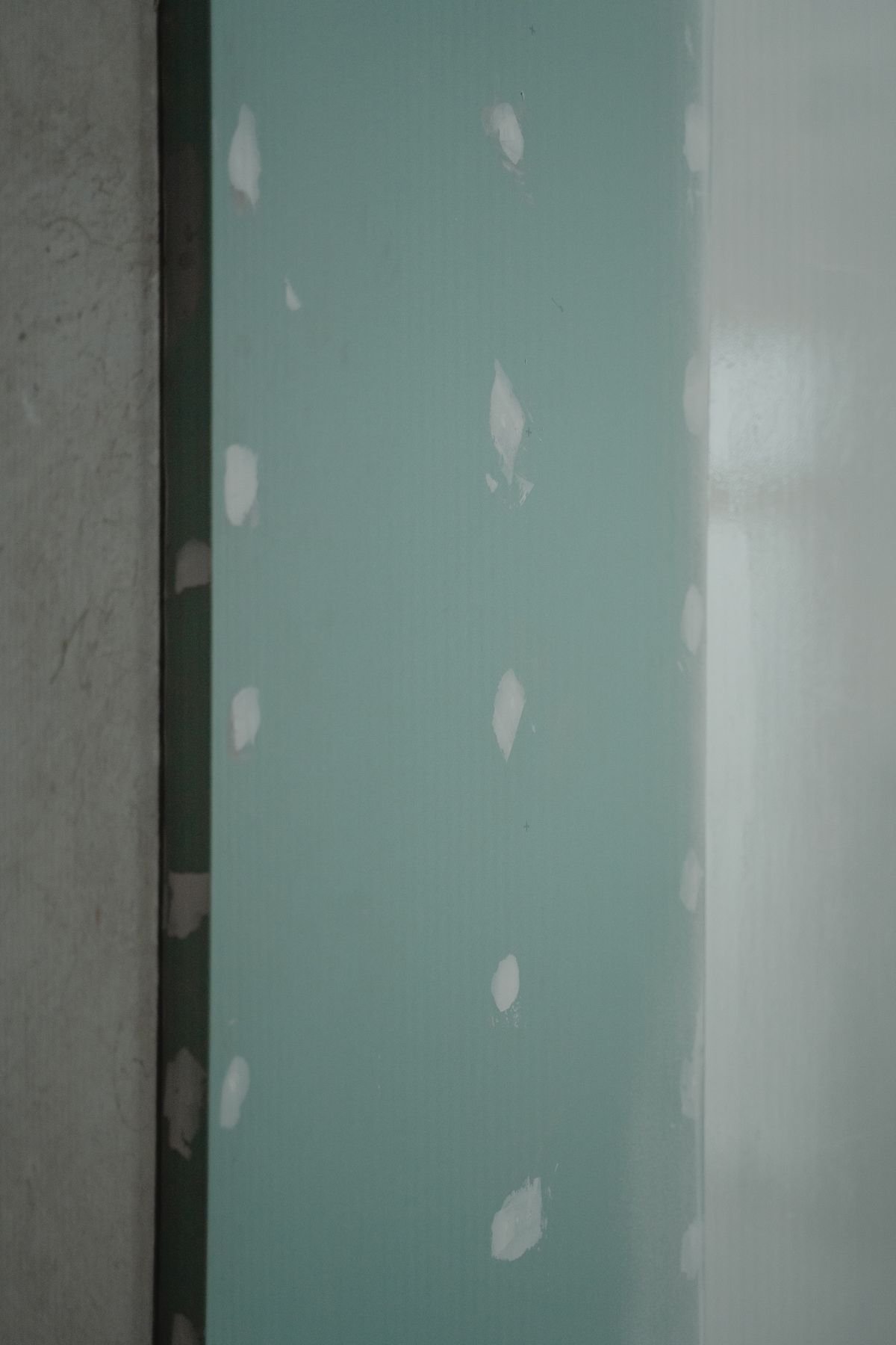 Freshly installed drywall panel ready for finishing