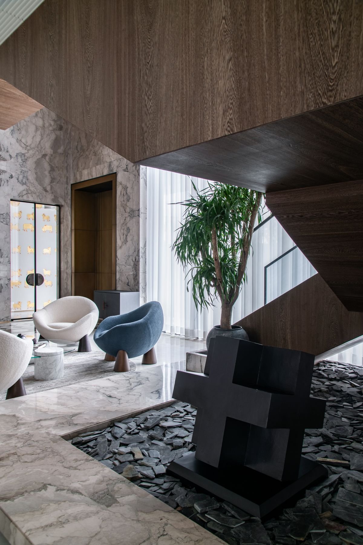 Stylish living space with contemporary furniture and marble textures