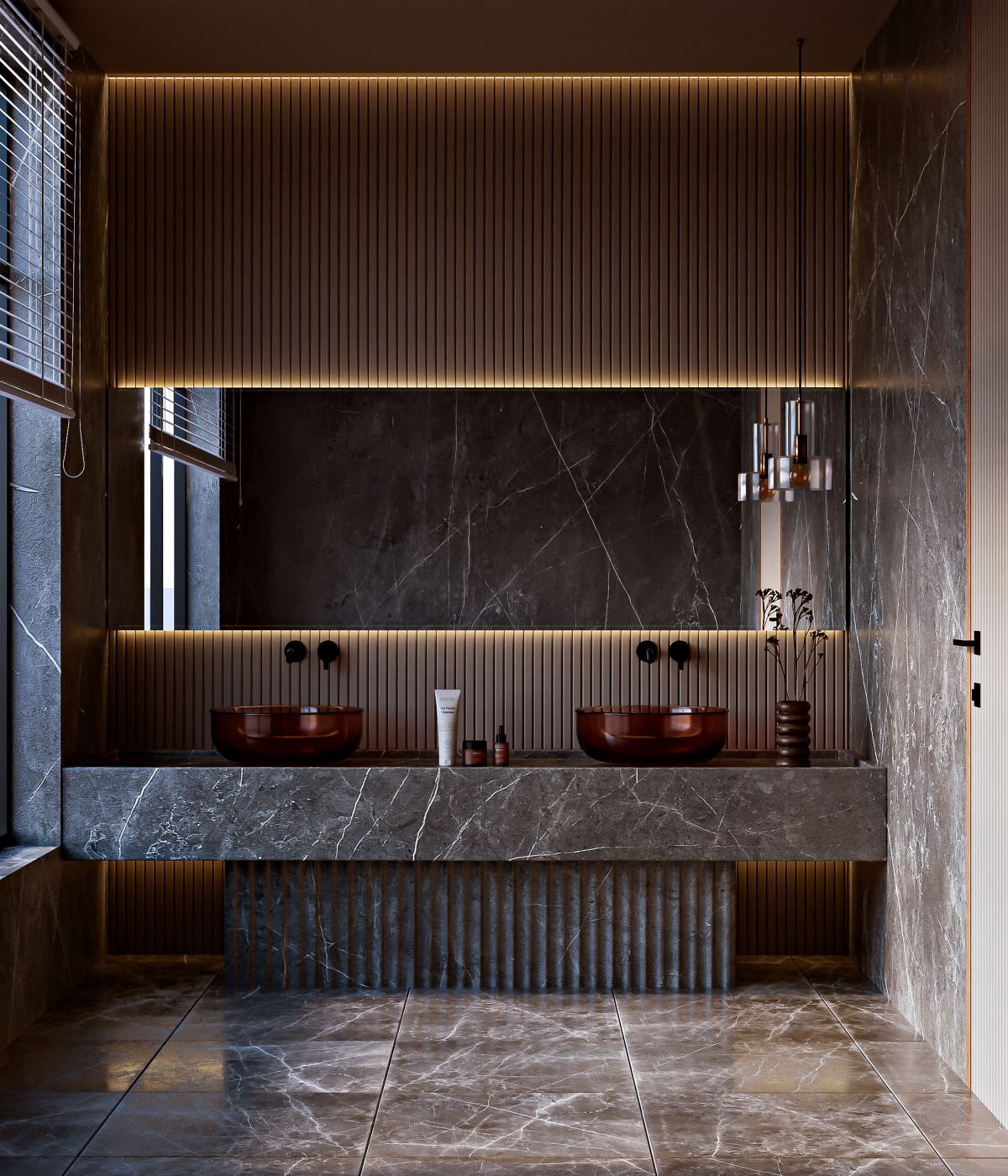 Dark marble bathroom with a floating vanity and warm accent lighting