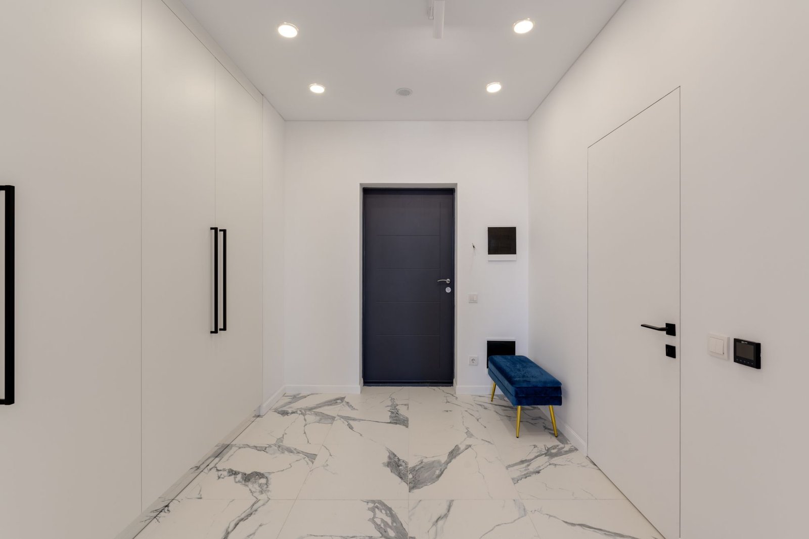 Sleek contemporary corridor with polished marble flooring