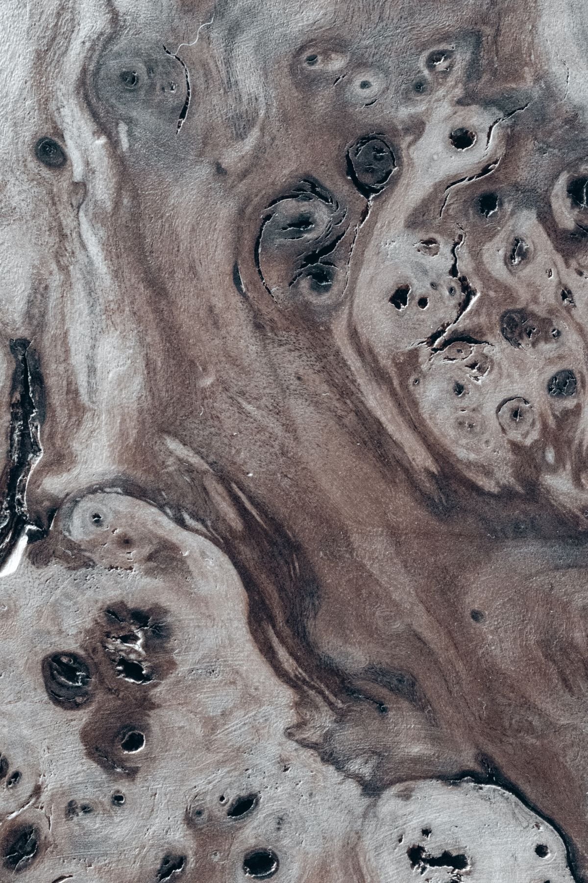 Close-up of a marbled stone surface in earthy tones