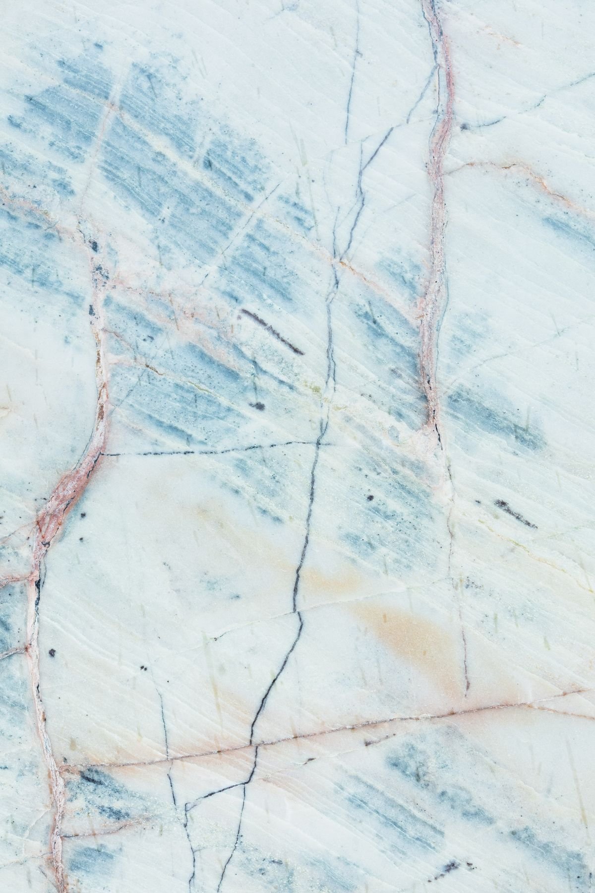 Light blue-toned marble surface with fine natural veining