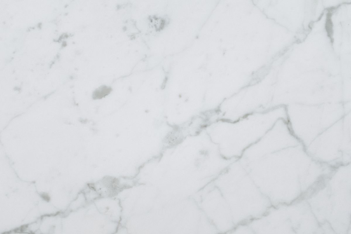 Light marble surface showing subtle natural grey veining