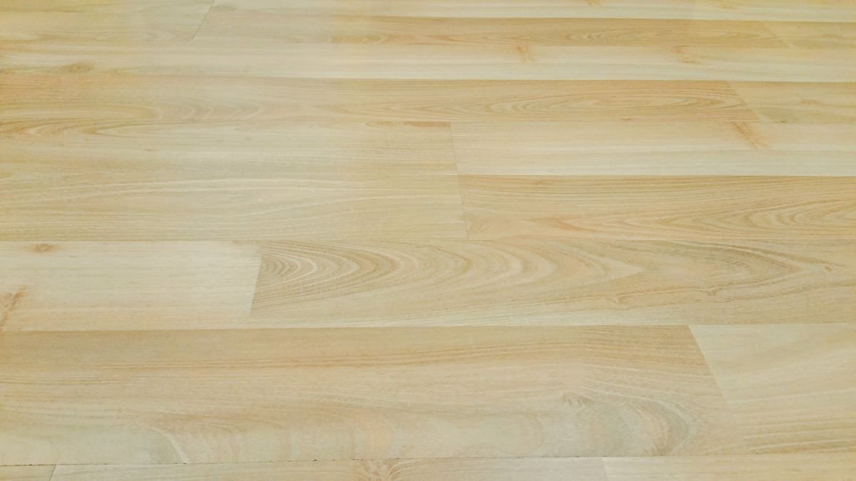 Light oak-toned wood-look planks with a soft grain
