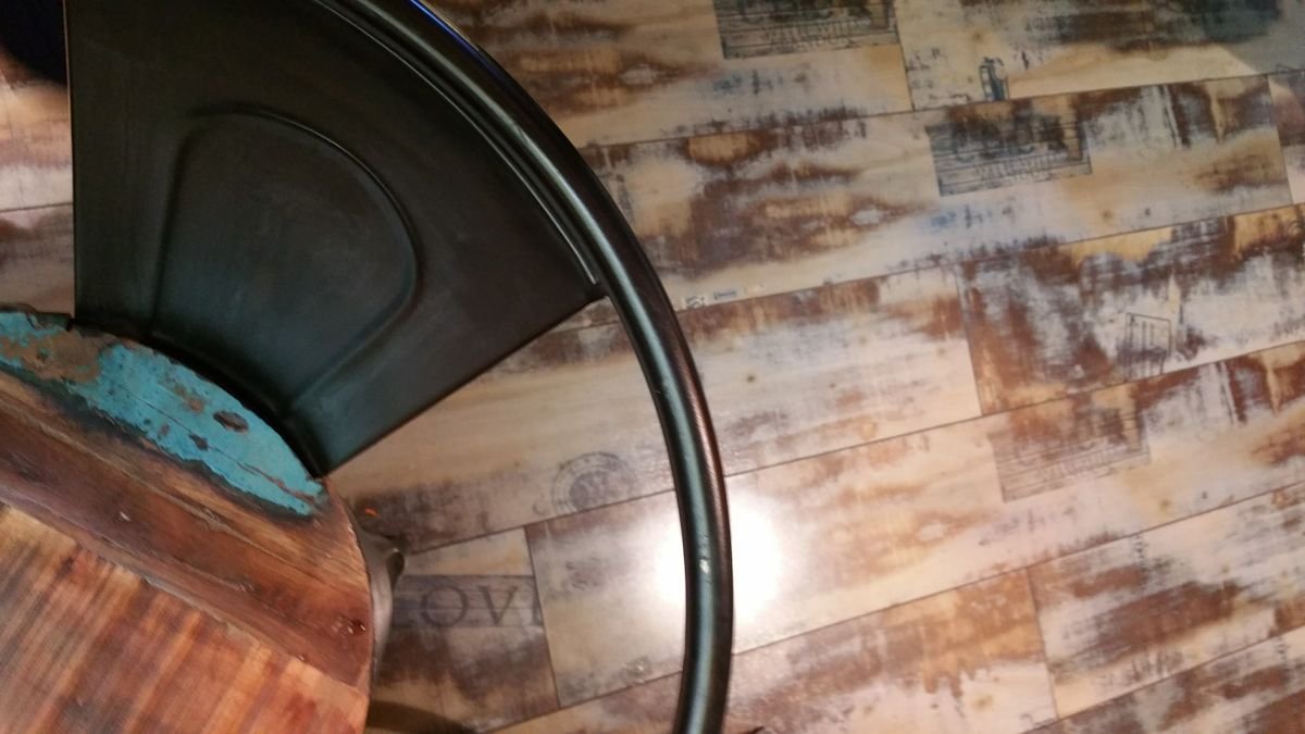 Weathered multi-tone plank flooring with a distressed finish