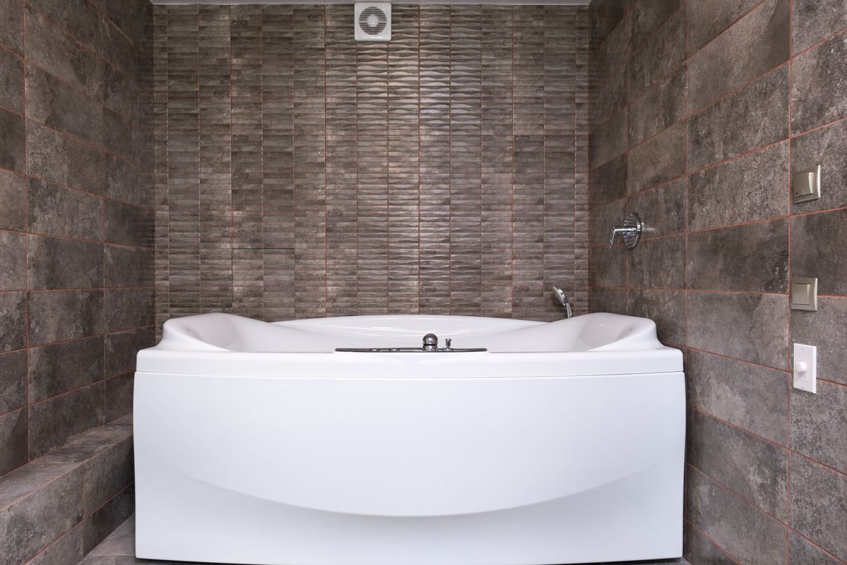 Contemporary bathroom with white tiled walls and hot tub v2