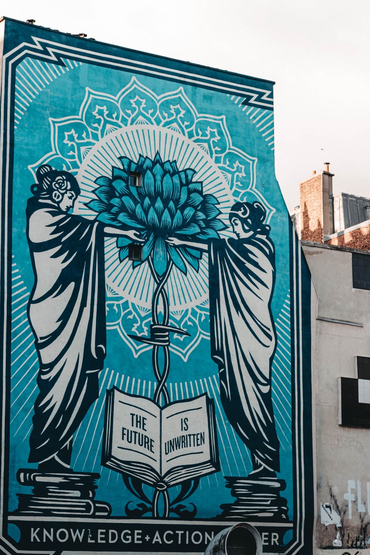 Large illustrated mural covering the side of a building