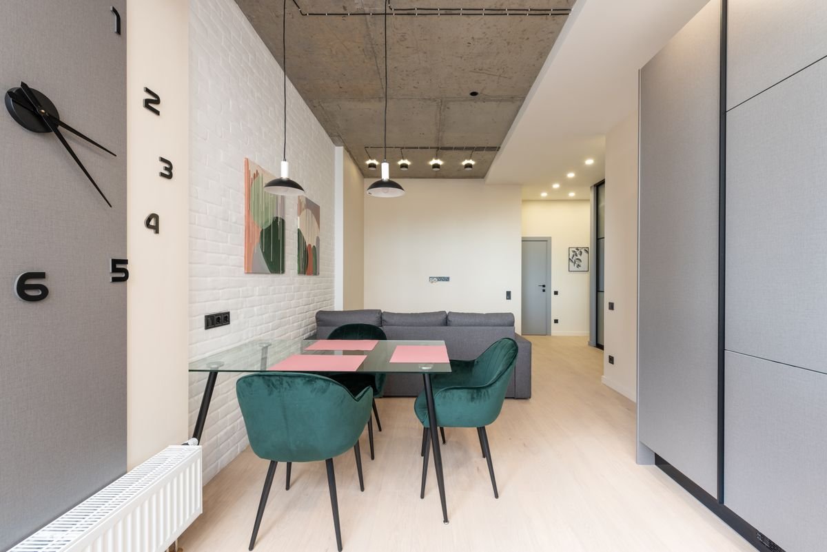 Bright hallway and dining area with freshly finished light walls